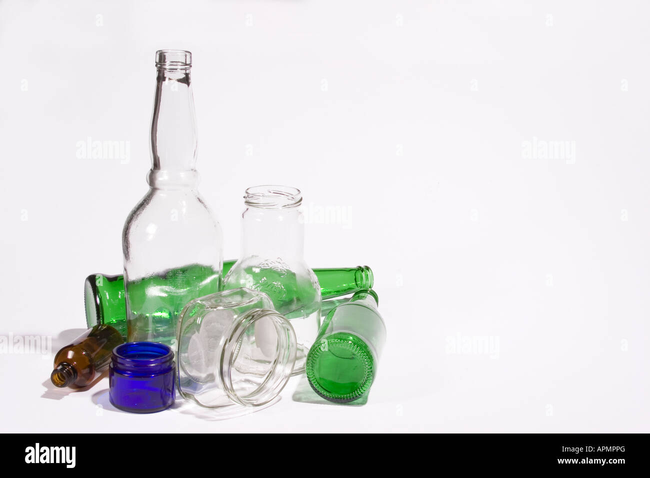 Glass bottles for recycling against a white background Stock Photo - Alamy