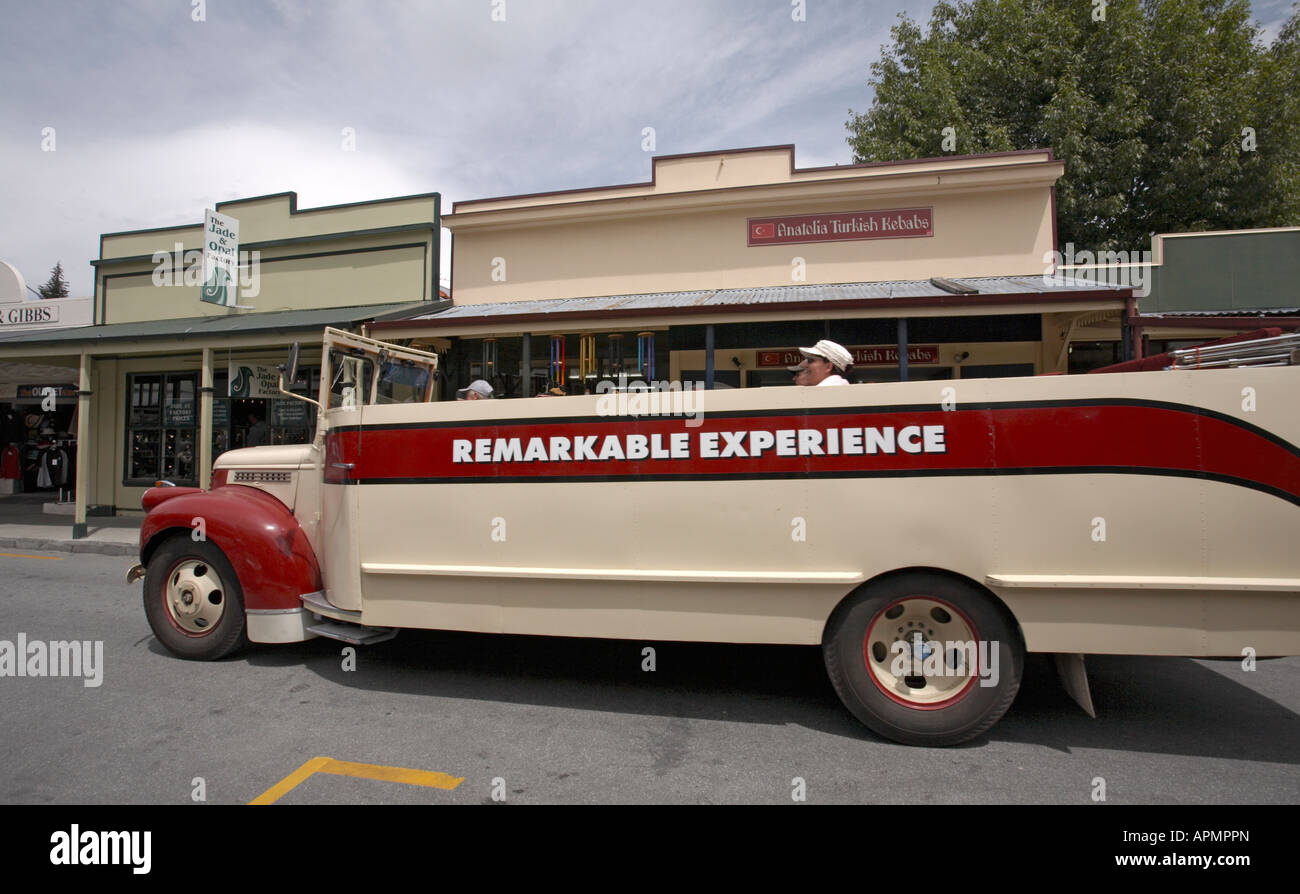 A Remarkable Experience bus ride through Buckingham Street, Arrowtown, Otago, South Island, New Zealand Stock Photo
