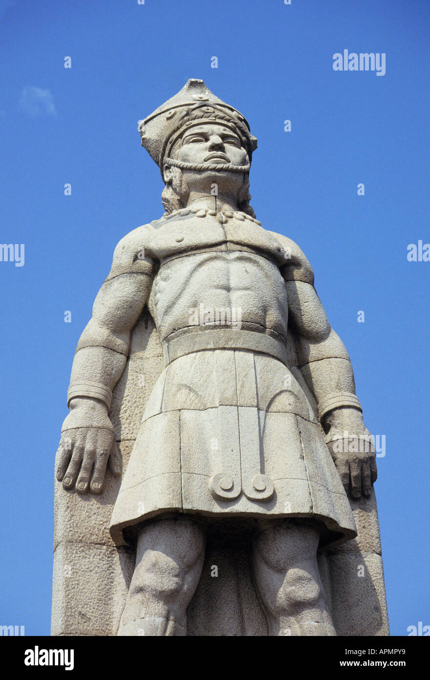 A statue of the last Tarascan Indian King outlined against the blue skies stands in Colima the third city established by the Spaniards in Mexico in 1523 though most of its monuments date from the nineteenth century Stock Photo