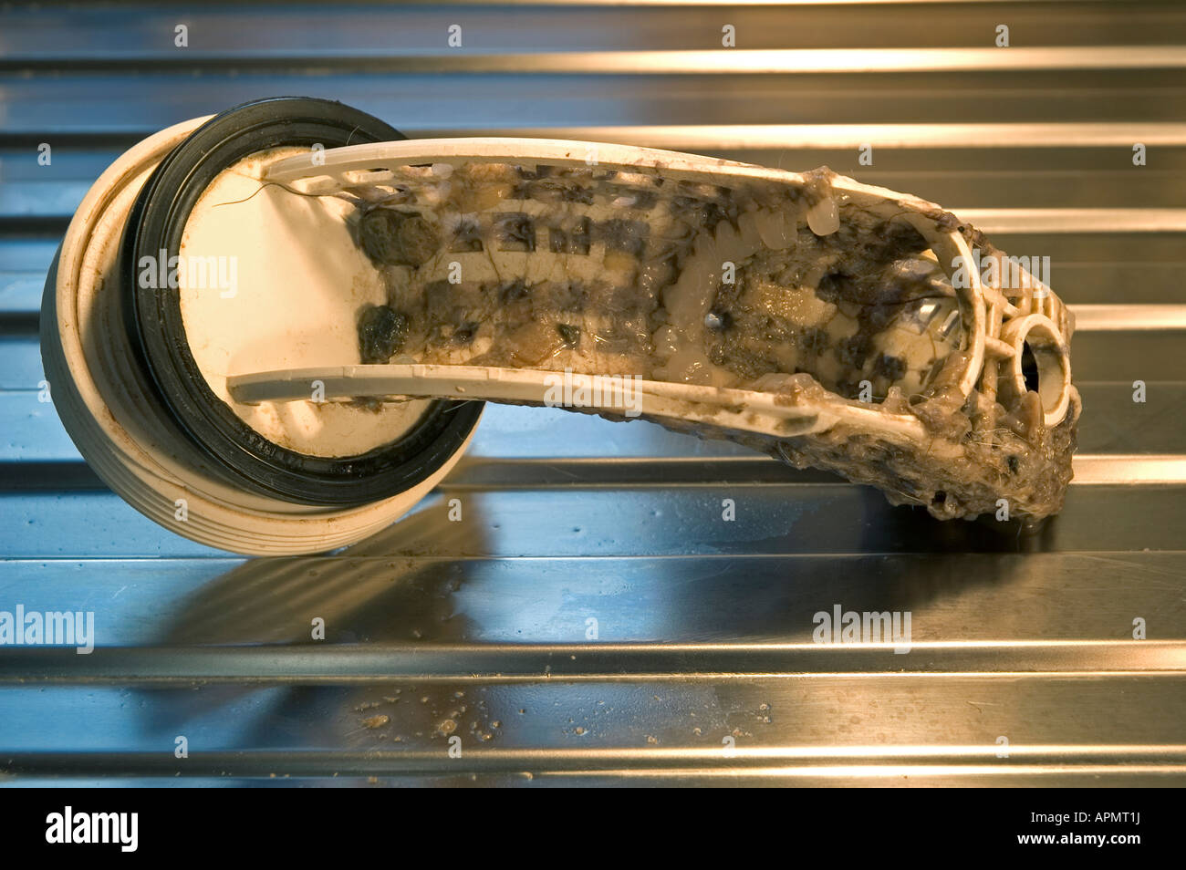 a washing machine filter blocked with dirt Stock Photo Alamy