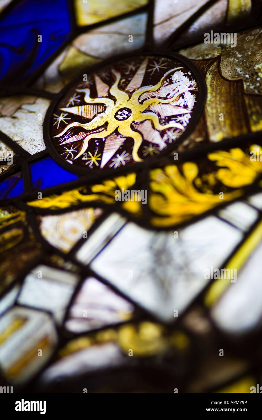 Stained glass detail, St. Leonards Church, Bledington, Gloucestershire, UK Stock Photo