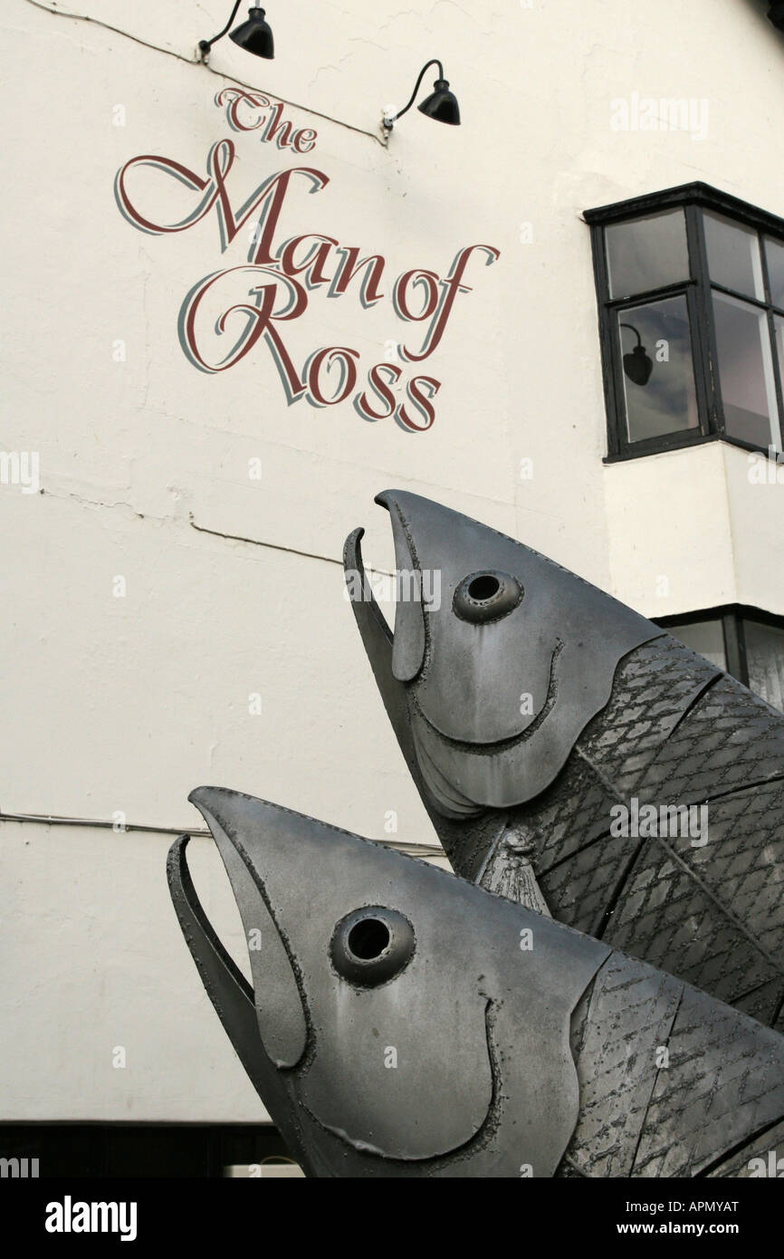 Sculpture of Salmon leaping outside The man of Ross Public House Ross
