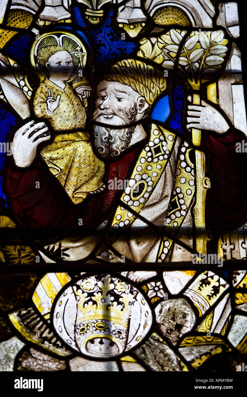 Stained glass detail of John the baptist, St. Leonards Church, Bledington, Gloucestershire, UK Stock Photo