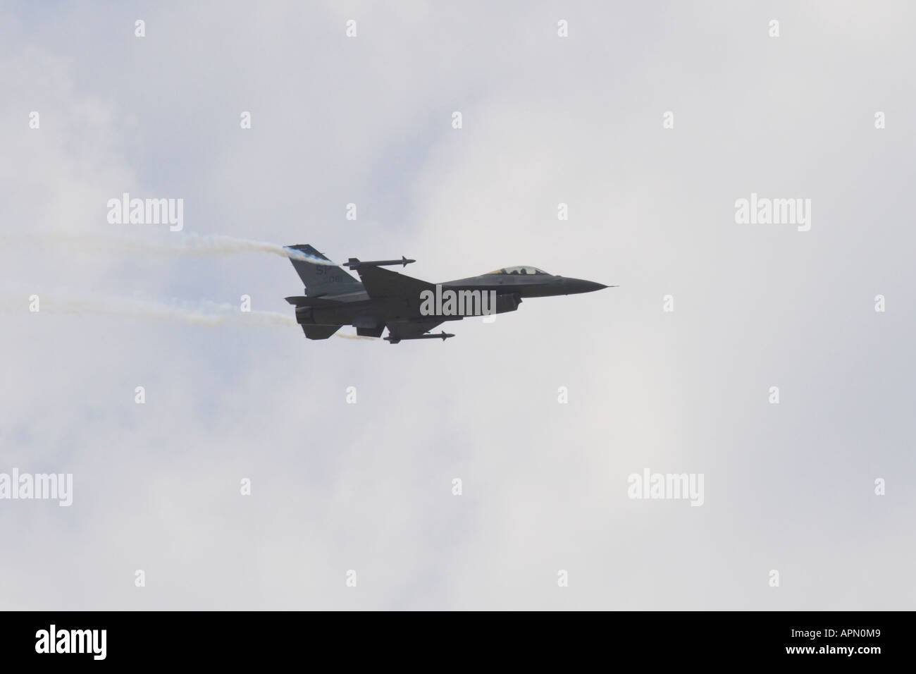 Falcon F16 making a left to right fly by Stock Photo