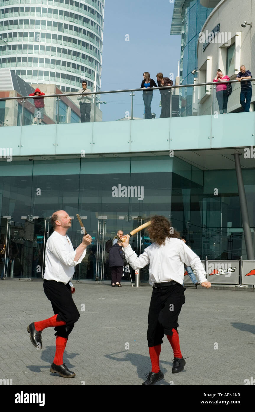 Morris dancers performing a traditional stick dance, Bull Ring