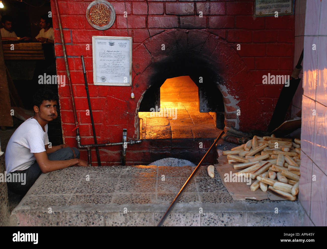 Young man baker in Sana'a, Yemen. Stock Photo