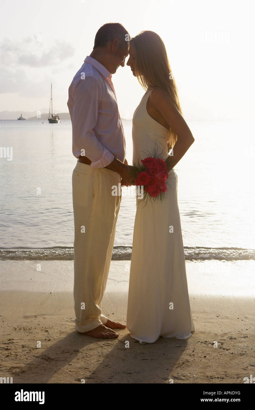 Newlyweds on beach, St. John, US Virgin Islands, USA Stock Photo