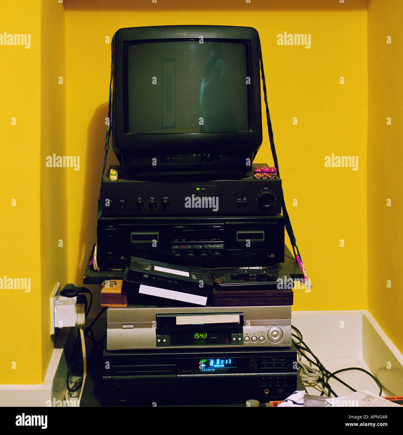 Television on stack of electrical equipment Stock Photo Alamy