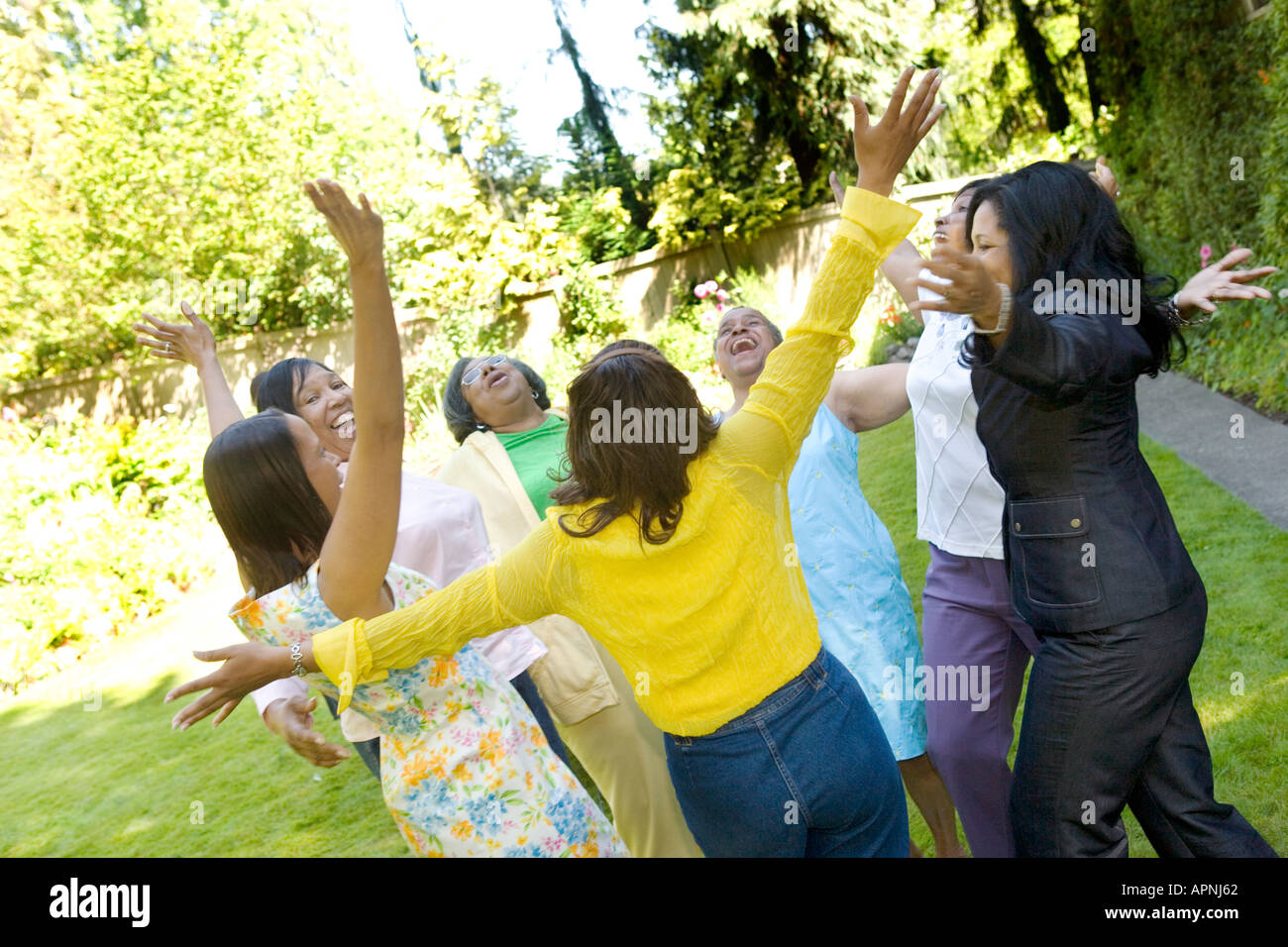Enthusiastic females outdoors Stock Photo
