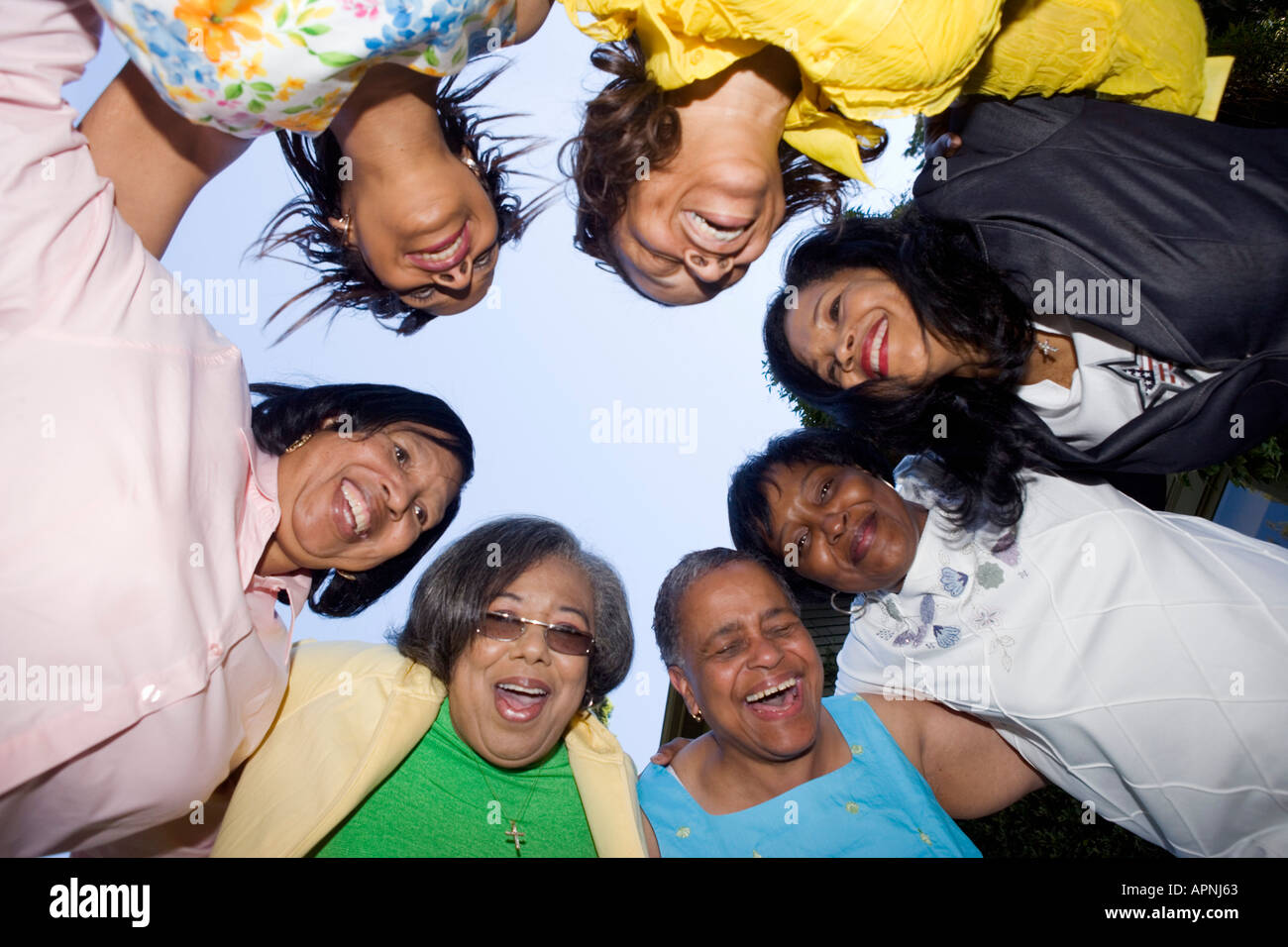 Low angle view of lively females Stock Photo