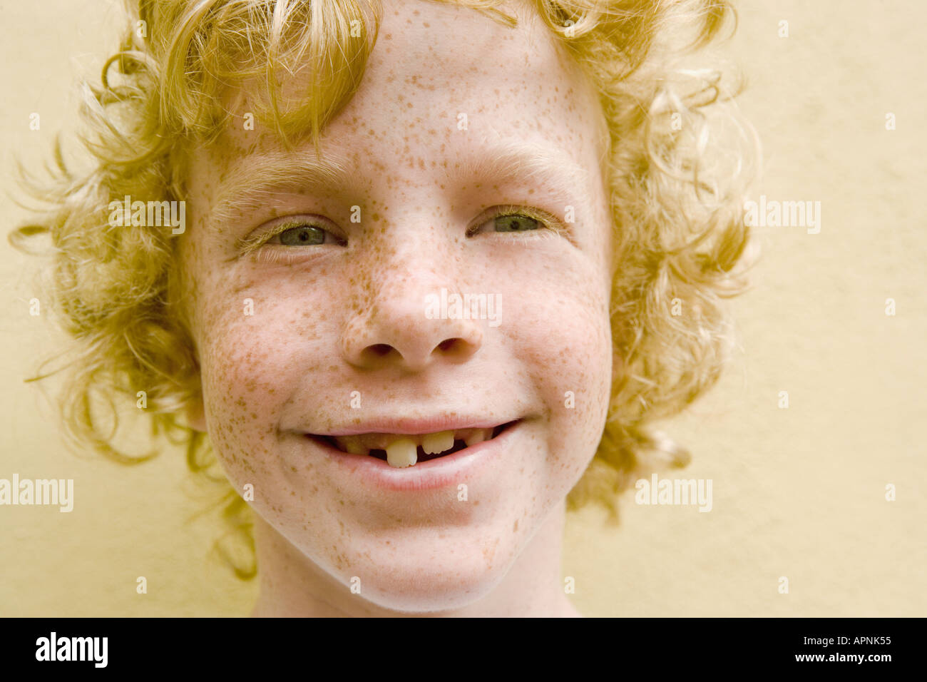 Portrait of a smiling young boy Stock Photo - Alamy