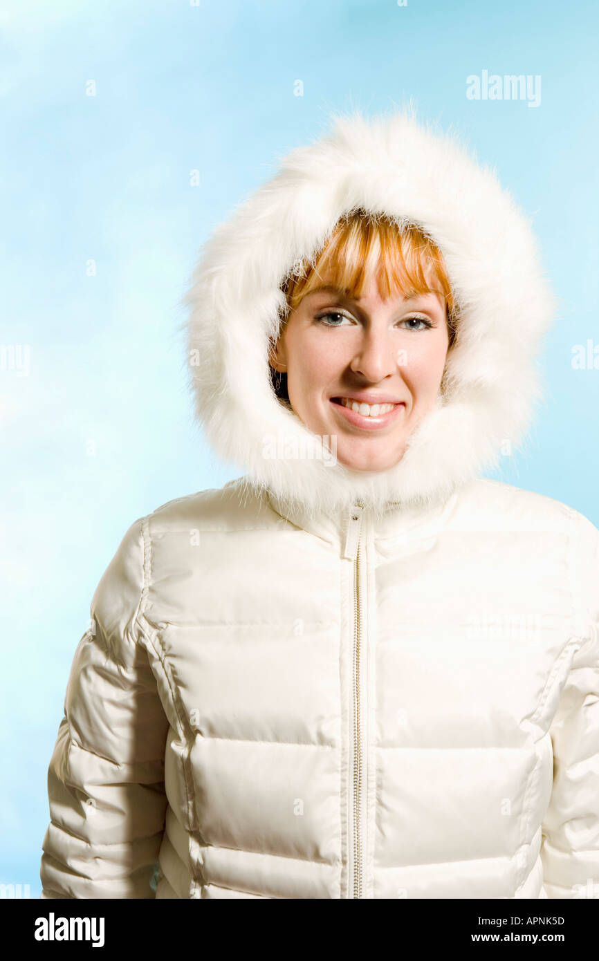 Woman dressed in winter jacket Stock Photo