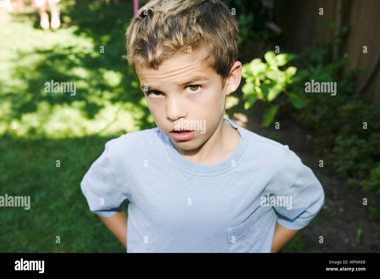 Boy with a quizzical expression Stock Photo