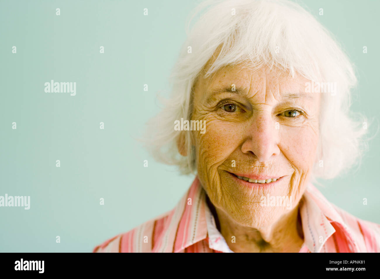 Smiling pretty senior female hi-res stock photography and images - Alamy