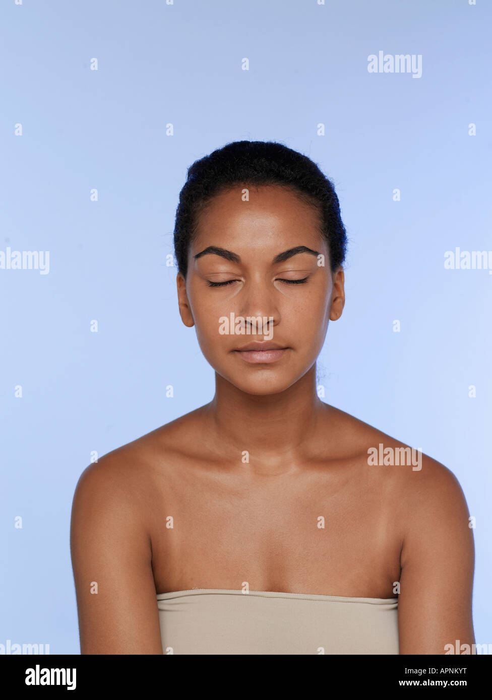 Portrait of young woman with eyes closed Stock Photo - Alamy