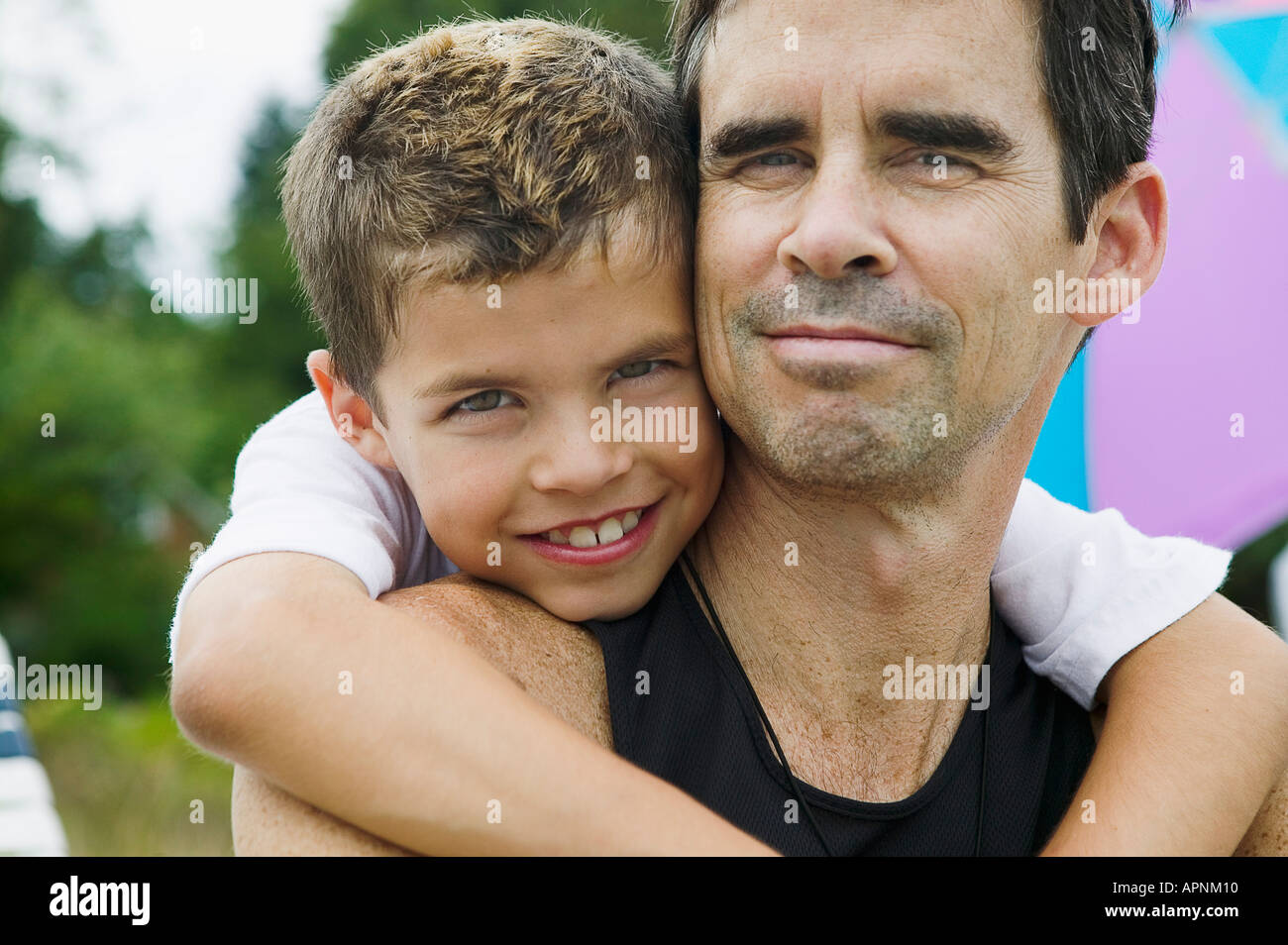 Portrait of father and young boy Stock Photo