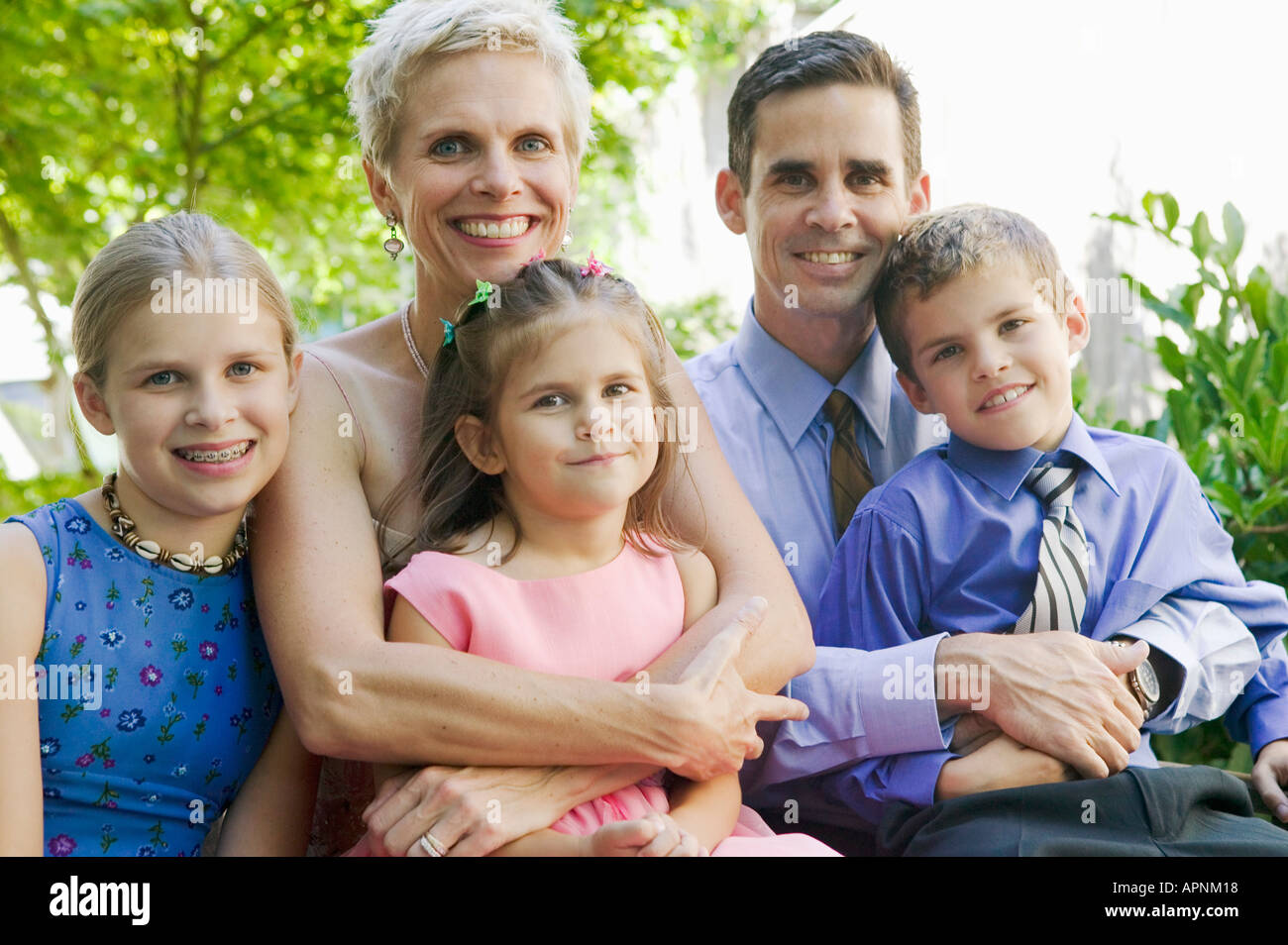 Portrait of parents and three children Stock Photo