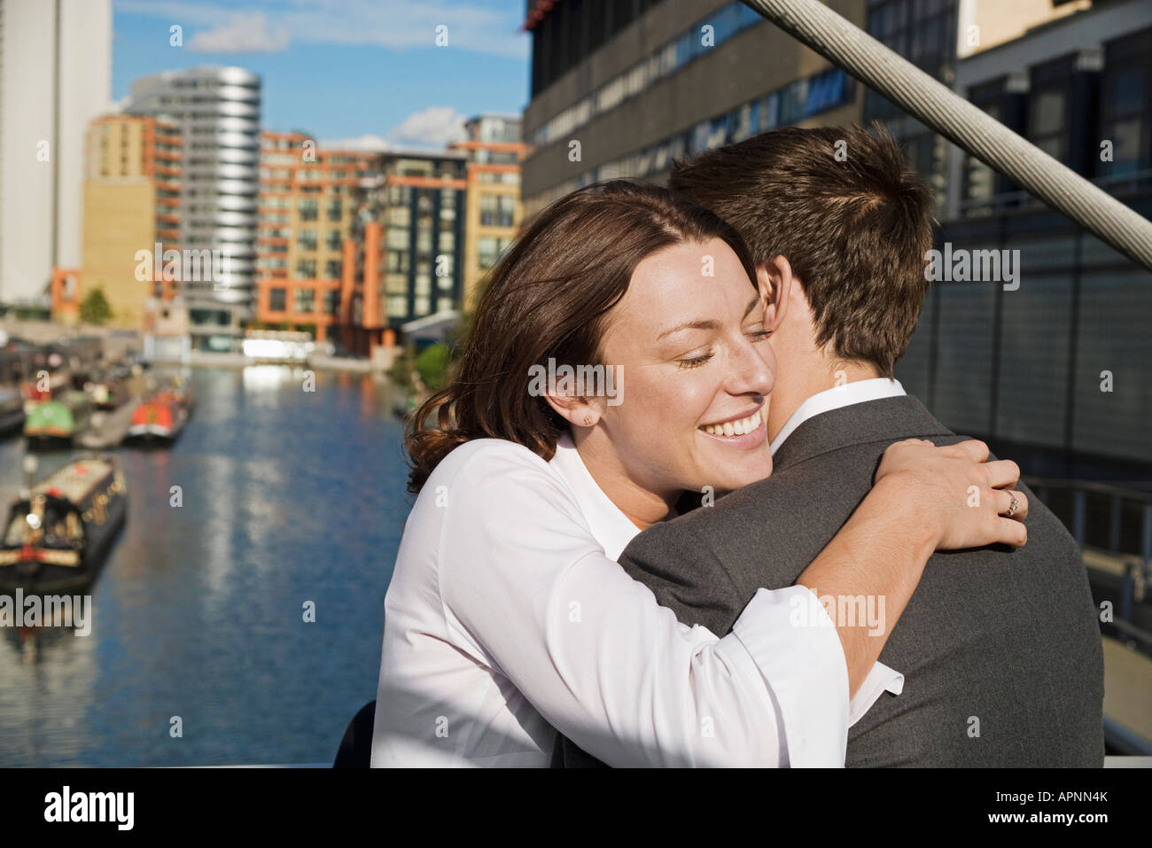 Couple hugging river hi-res stock photography and images - Alamy