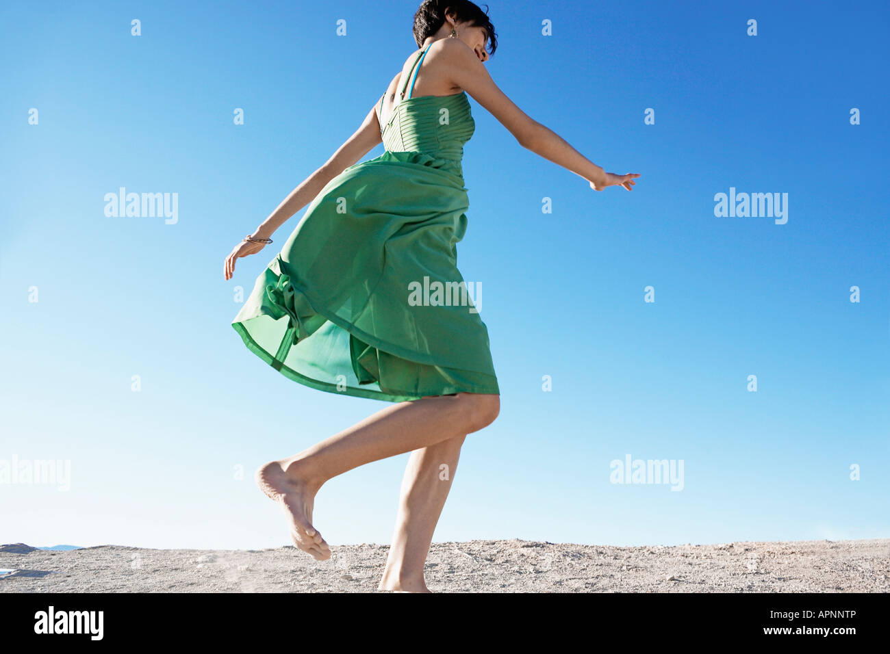 Woman running dress low angle hires stock photography and images Alamy