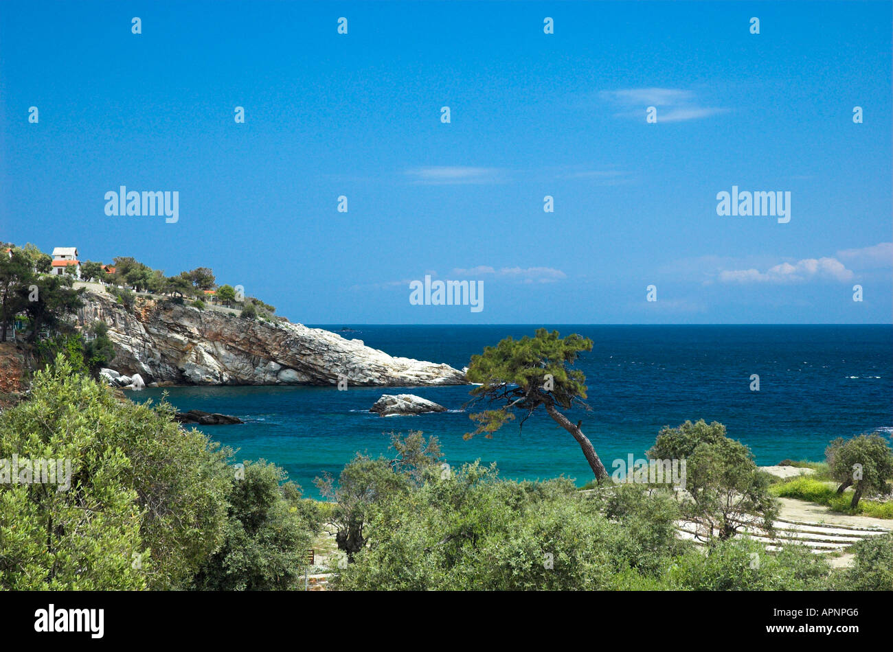 The headland and bay of Alyki on the island of Thassos Greece Stock Photo