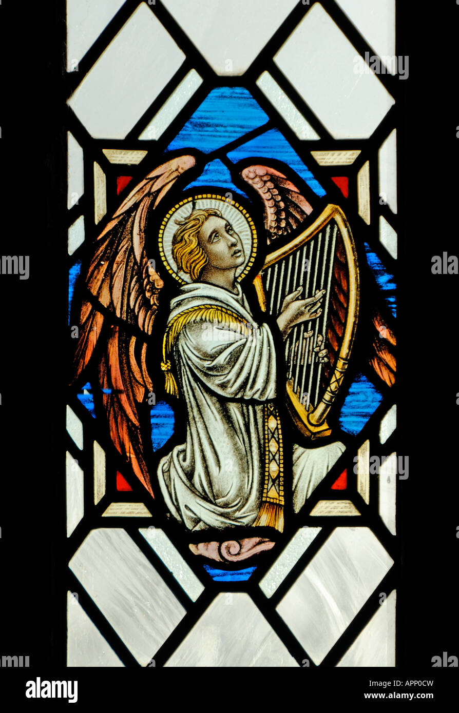 Angel playing harp, Chancel window (detail). Church of Saint John, Old Hutton, Cumbria, England, United Kingdom, Europe. Stock Photo