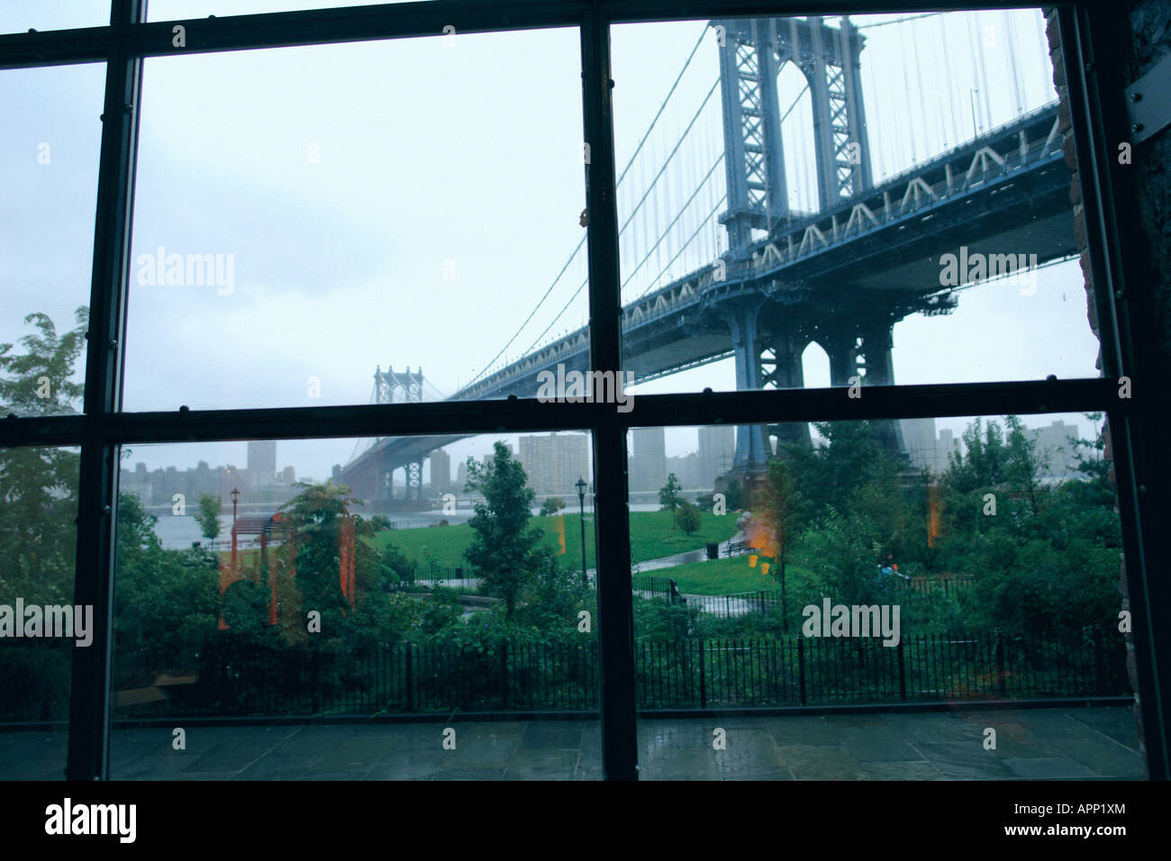 Urban Scene of The Manhattan Bridge in New York City USA Viewed Through a Window Copy Space Stock Photo