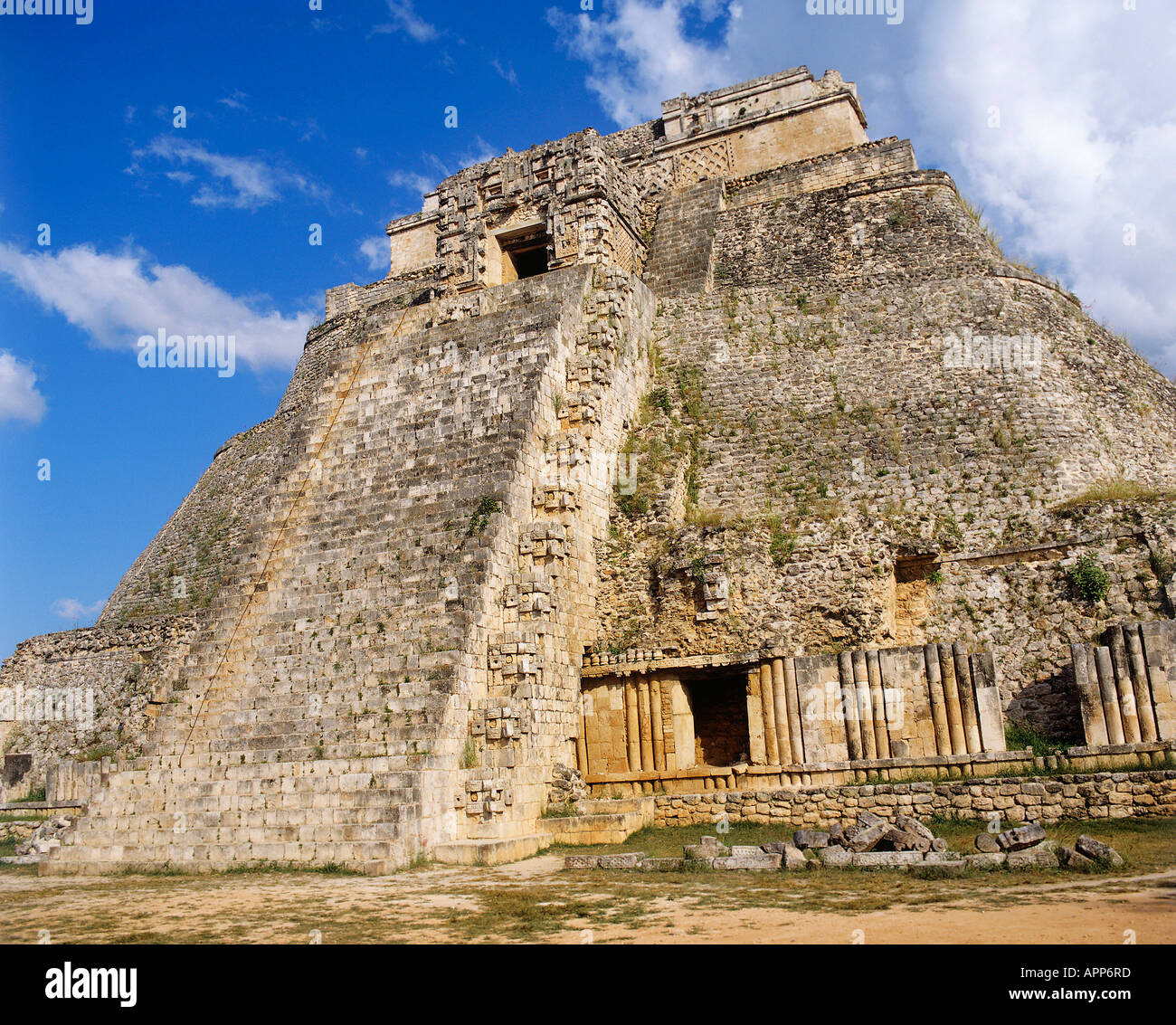The ruins of the Pyramid of Adivino The Magician a Puuc style temple decorated with interlacing mouldings on each side of the door at the ancient city of Uxmal one of the largest and most powerful of the north Yucatan cities Stock Photo