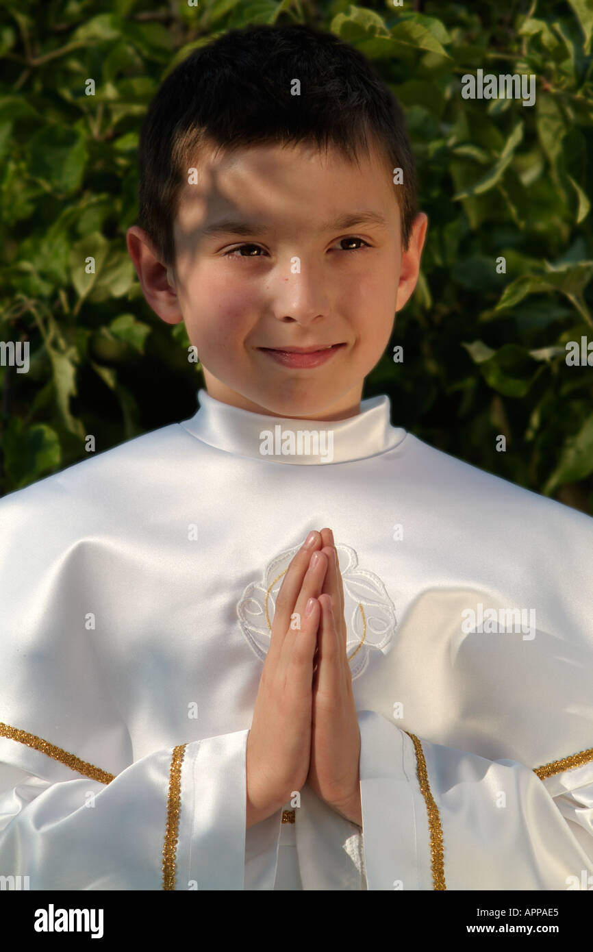 Portrait of boy dressed for communion Stock Photo
