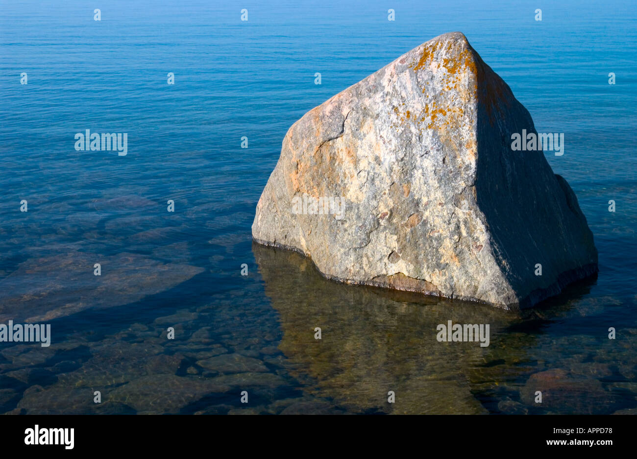 The rock and water concept of stability and might Stock Photo - Alamy
