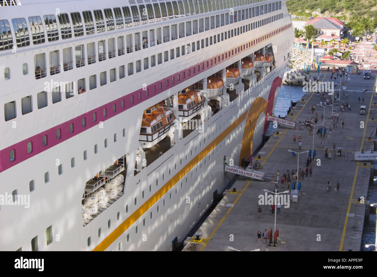 Pasengers returning to the Ocean Village Two cruise ship in Saint Maarten Stock Photo