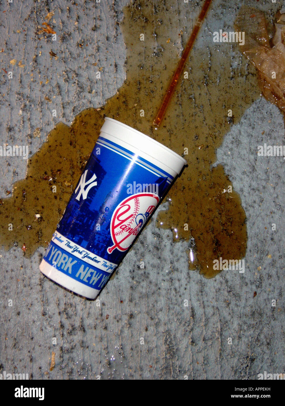 Spilled Plastic Logo Cup of Cola Soda at a Yankees Baseball Game at Yankee Stadium in The Bronx New York City USA Stock Photo