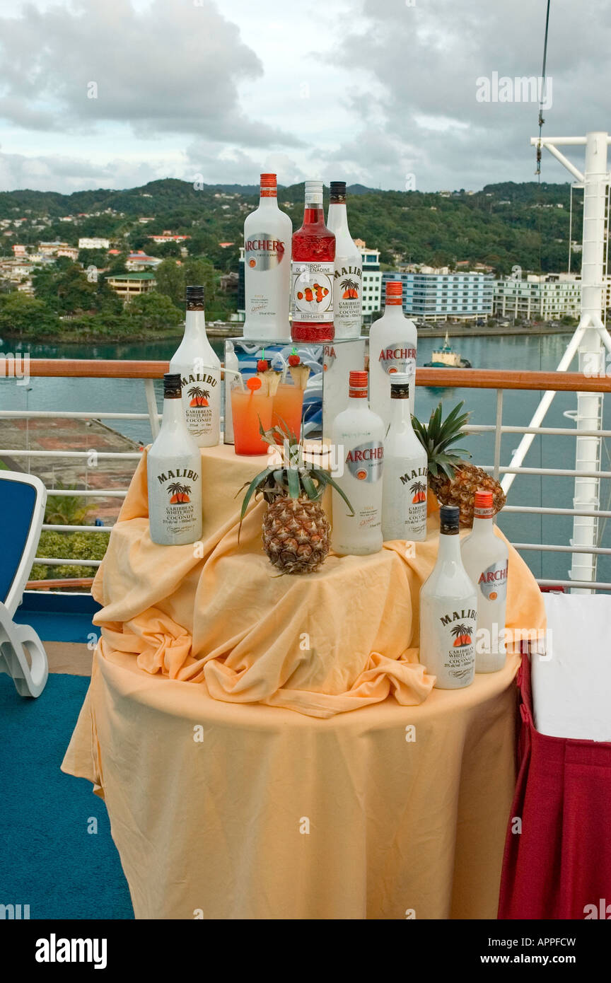 A well stocked table for preparing refreshing Pina Colada cocktails in the attractive setting of Castries, St Lucia Stock Photo