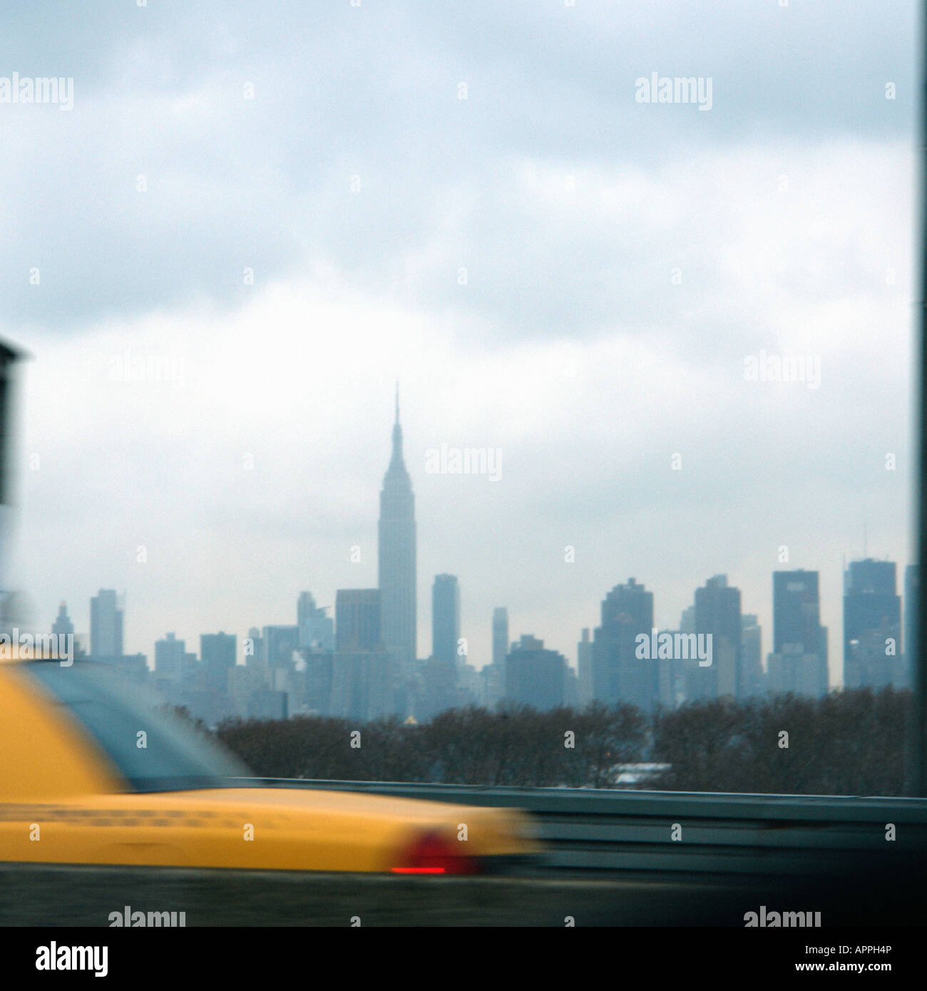 Urban Scene of a Yellow Taxi Cab and the New York City Skyline ...