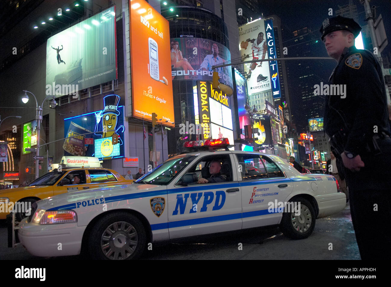 NYPD car and cop in Times Square Manhattan New York City Stock Photo
