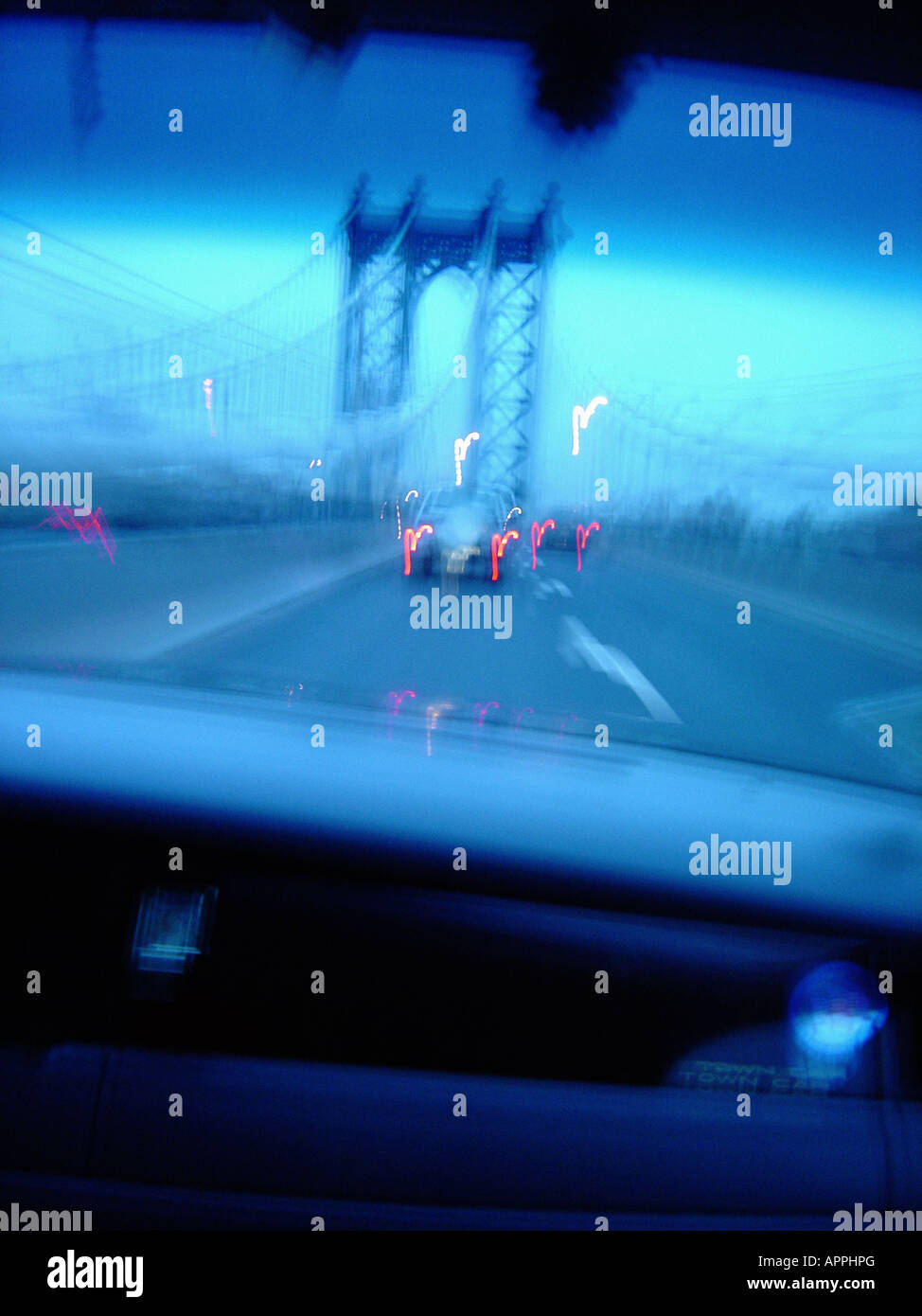 Early Morning Urban Scene of the Manhattan Bridge in New York City as Viewed From a Car Motion Blur Copy Space Stock Photo