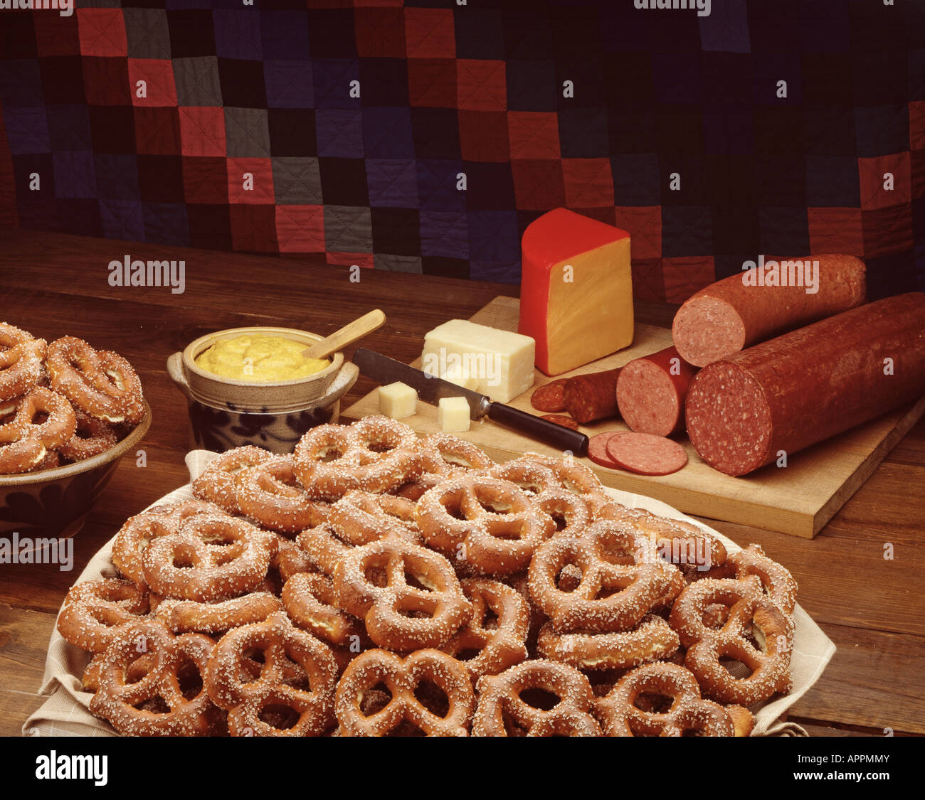 Snack food hard pretzels cheese bologna mustard americana quilt Stock Photo