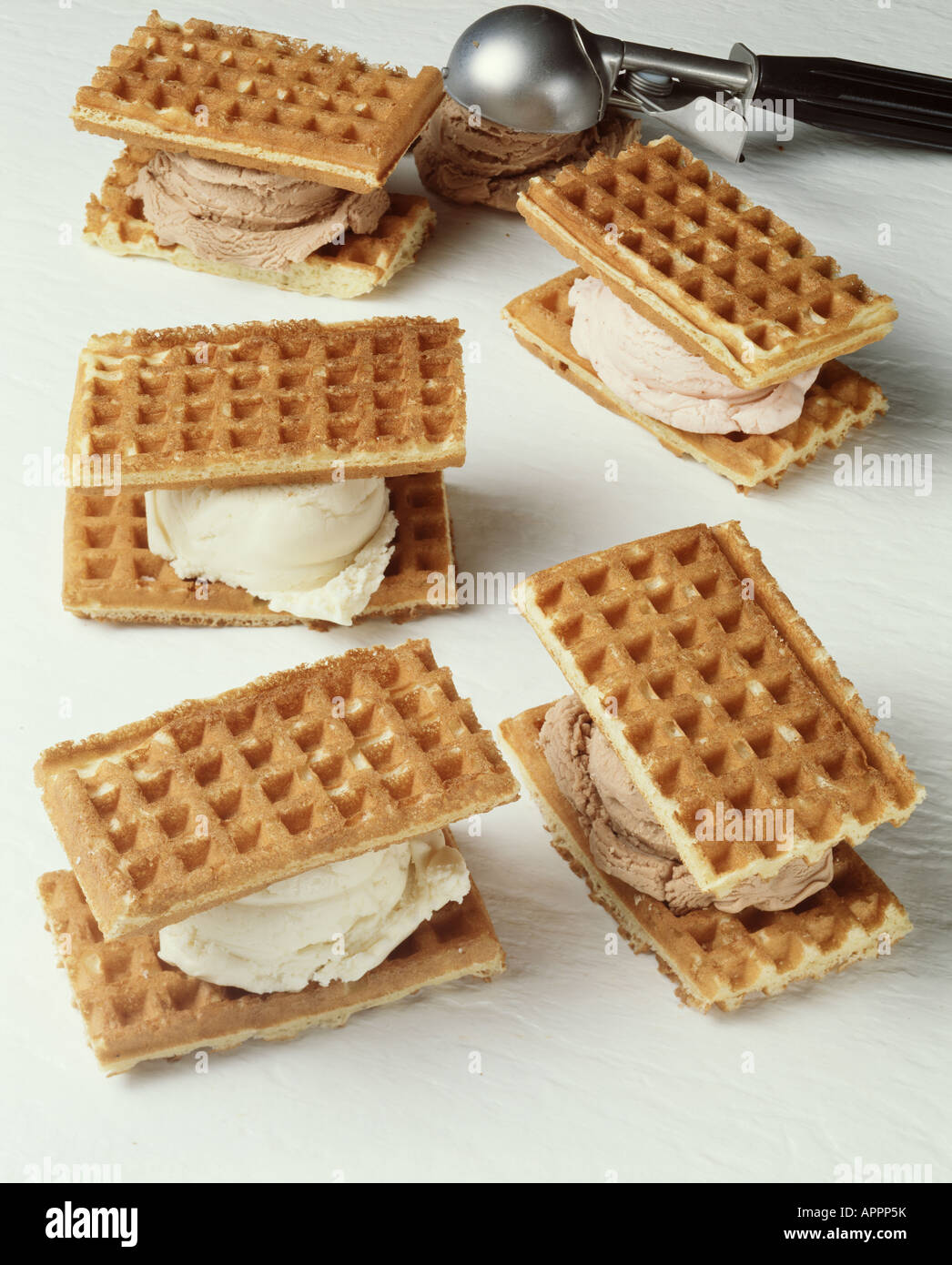 https://c8.alamy.com/comp/APPP5K/belgian-waffle-ice-cream-sandwich-with-scoop-APPP5K.jpg