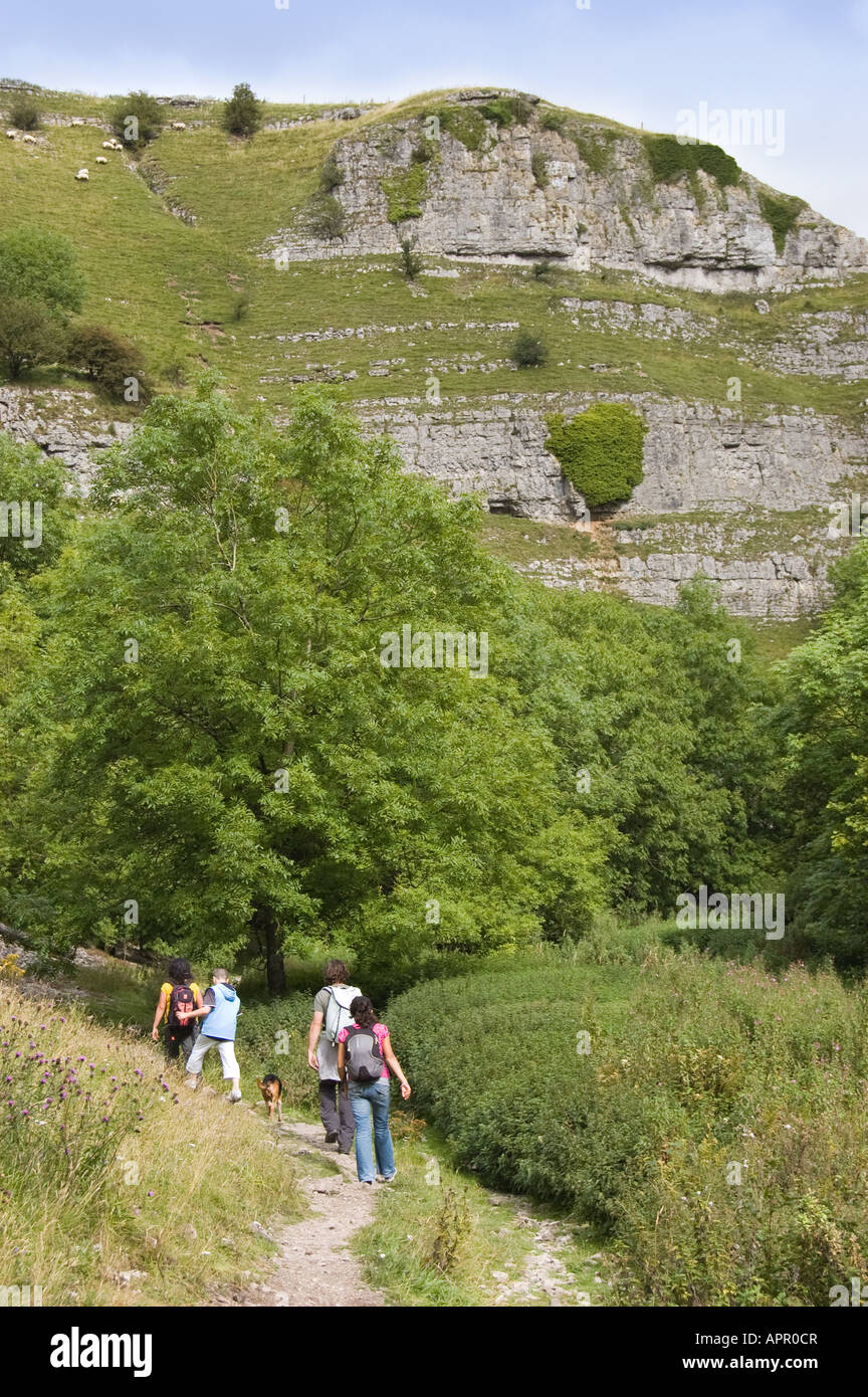 Family out walking in Lathkill Dale, Peak District, Derbyshire, England, UK Stock Photo