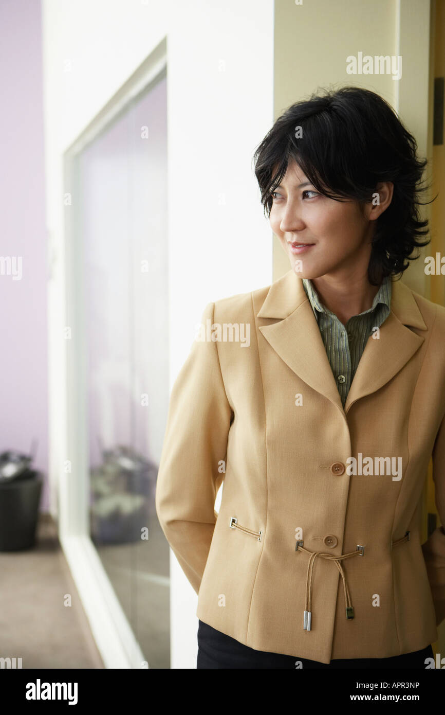 Kazakh woman standing in doorway Stock Photo - Alamy