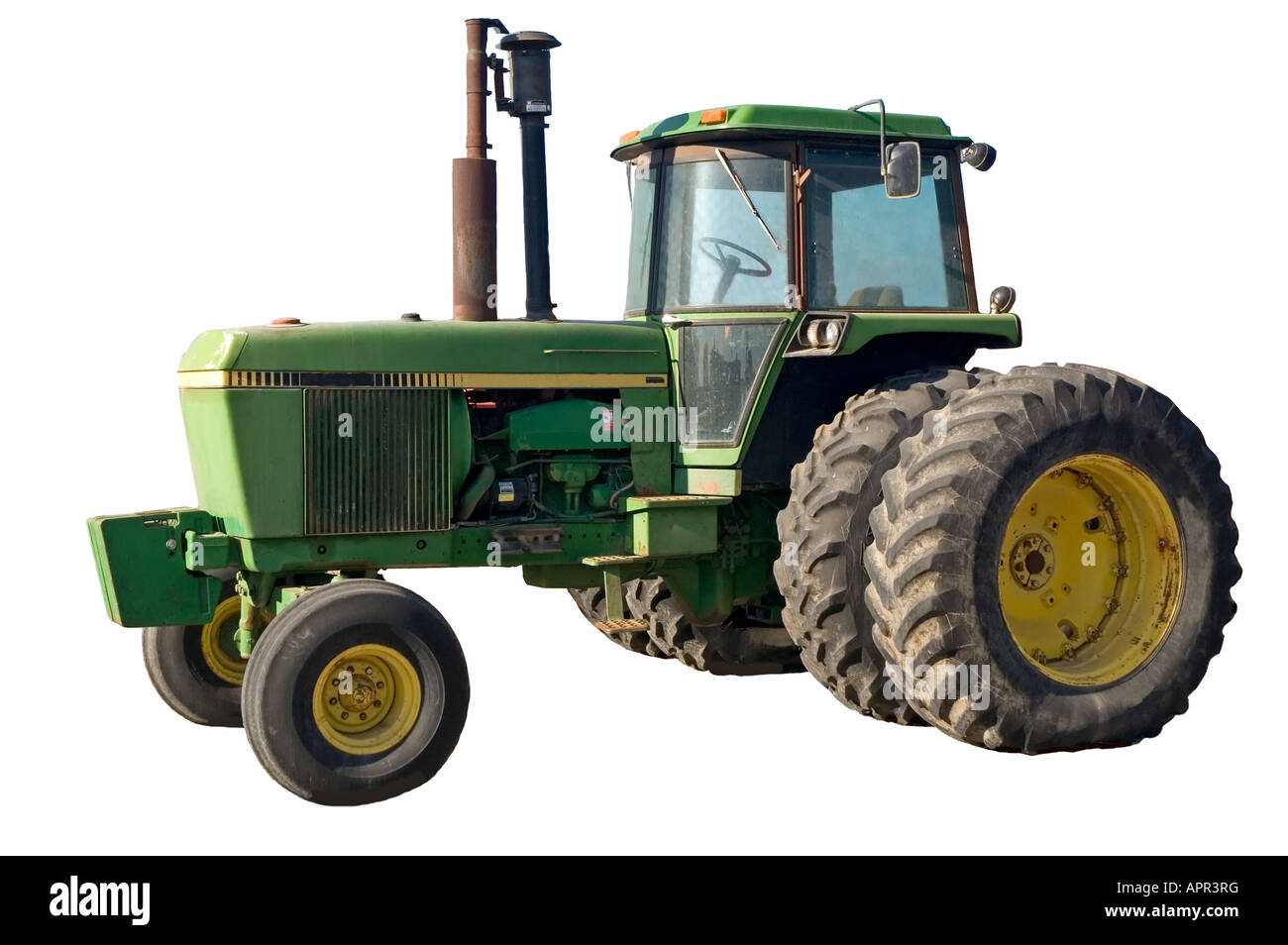 Old green tractor with fading paint Stock Photo - Alamy