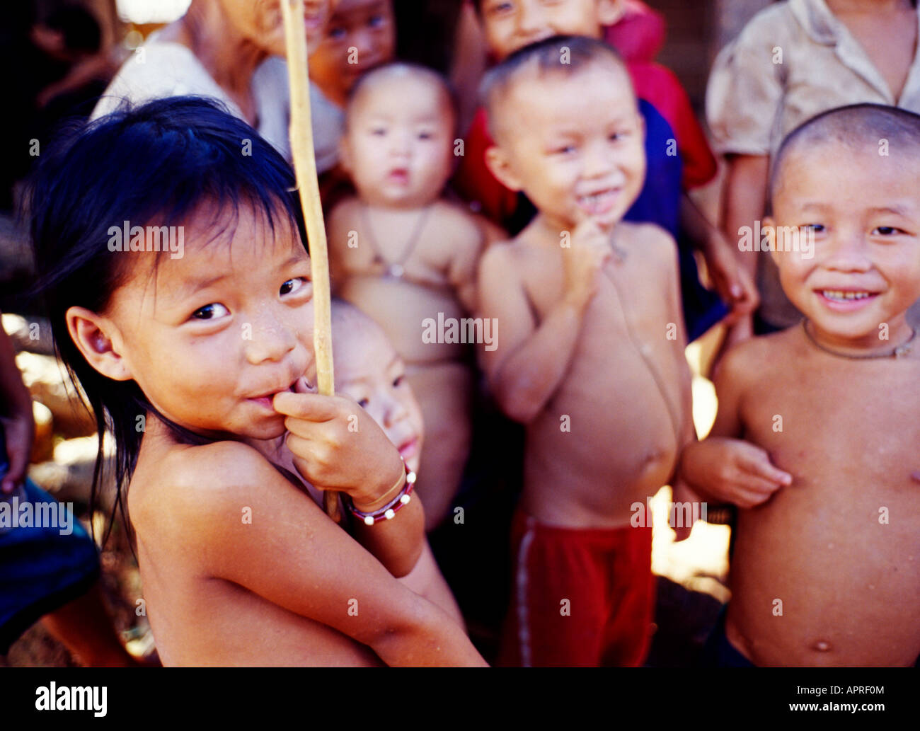  laos  children young children in small village, Laos Stock Photo - Alamy