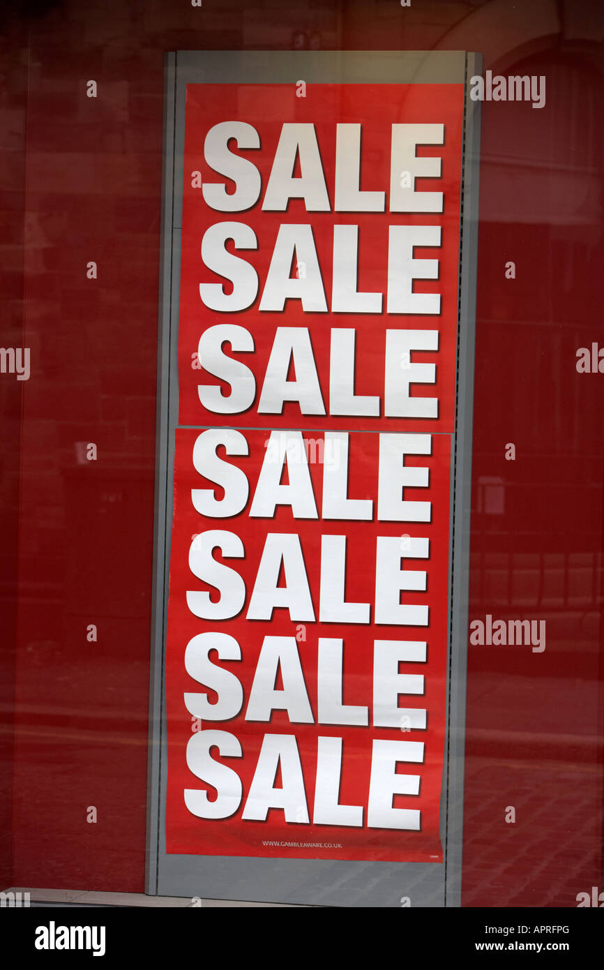 sale sign in a shop window Belfast Northern Ireland UK Stock Photo
