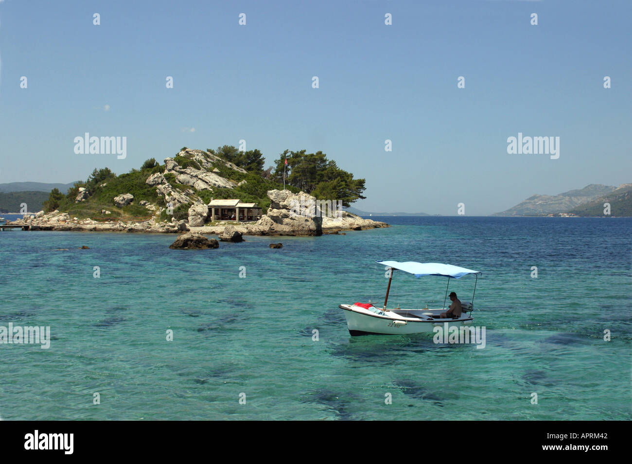 Small fishermans boat of the island of Stupa Dalmation coast Croatia off the island of Korcula Stock Photo