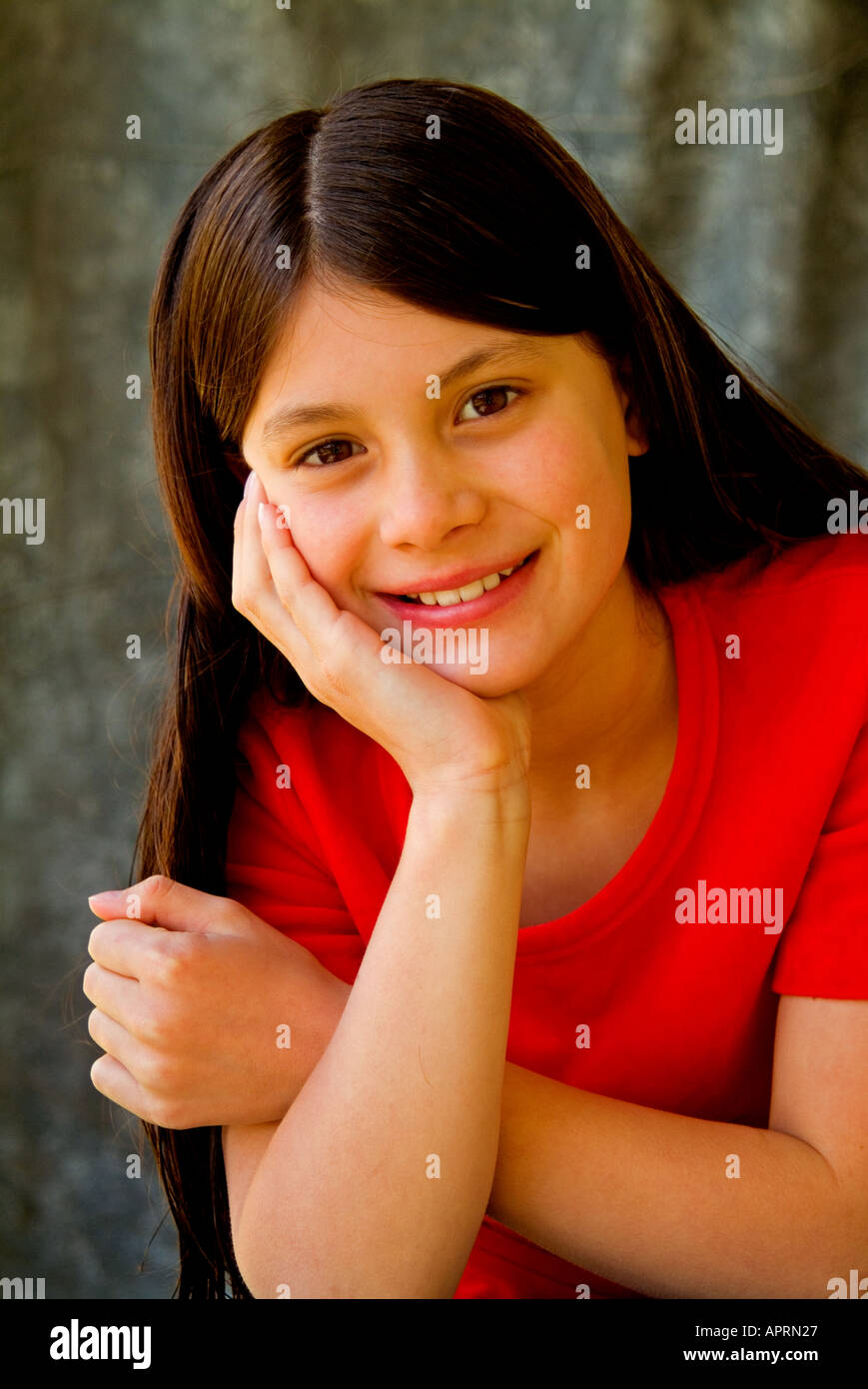Pretty young girl in red Tshirt Stock Photo Alamy