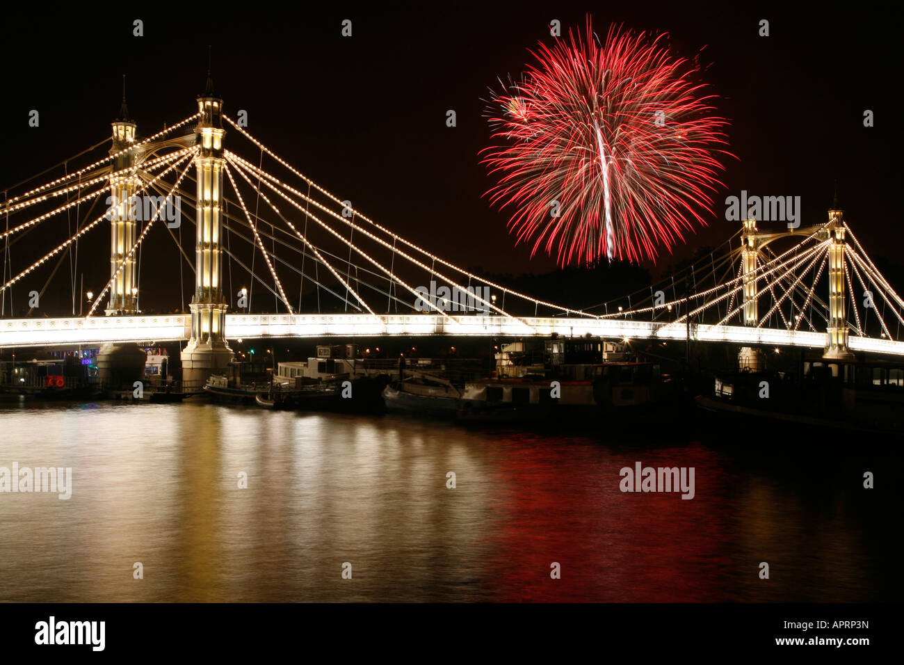 Battersea Park fireworks display seen from Albert Bridge in Chelsea, London Stock Photo
