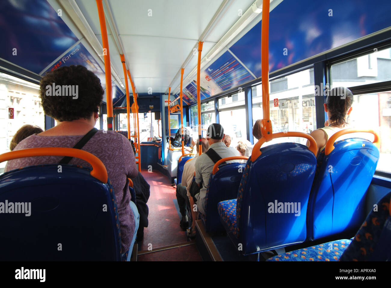 Interior of single deck bus serving suburban areas and transporting commuters to town centre Stock Photo