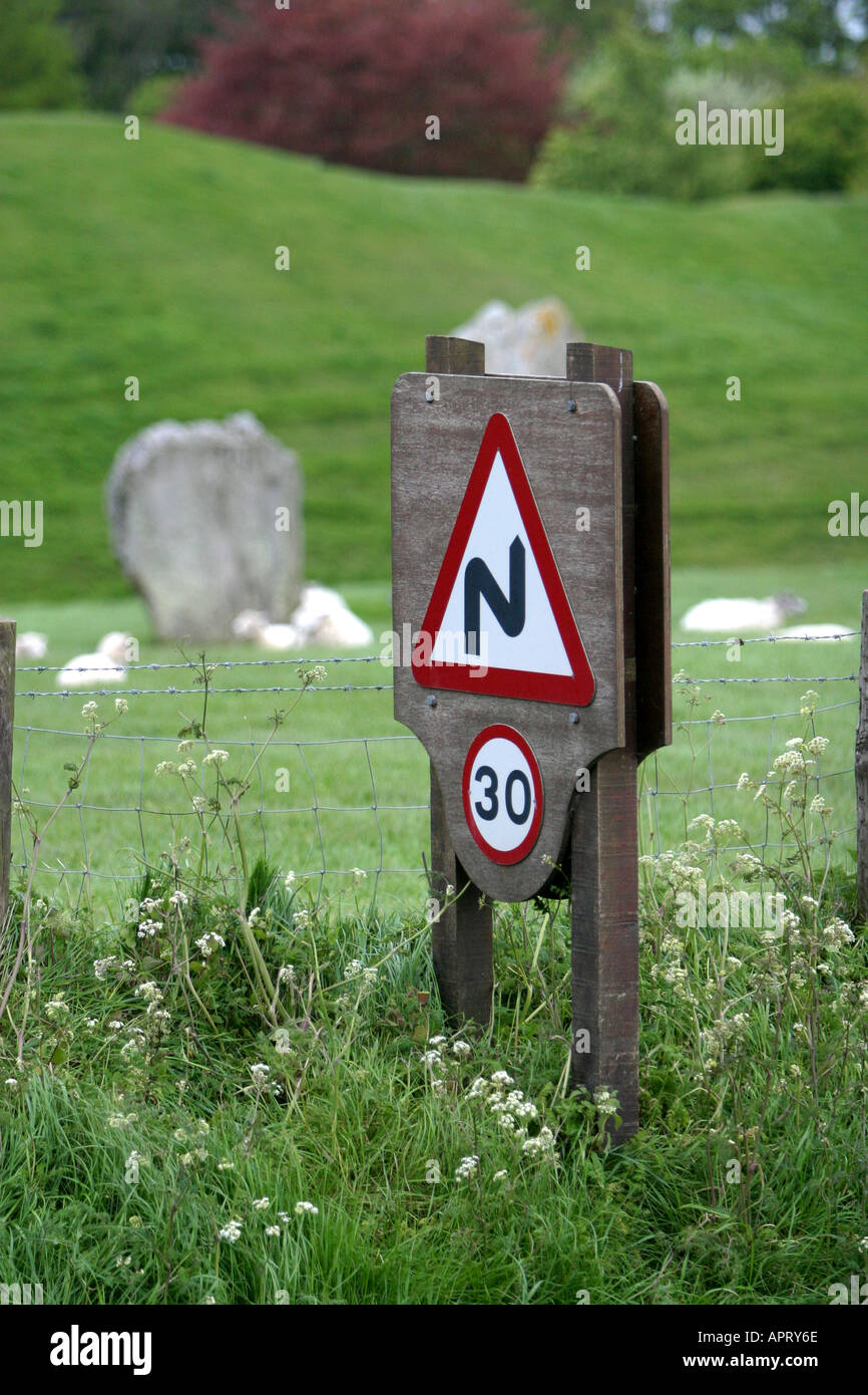 Speed limit 30mph and bendy road warning signs at Avebury in Wiltshire Stock Photo