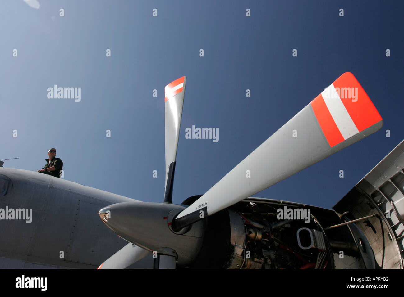 Front end of an Atlantique aircraft with airman watching flying display through top hatch Stock Photo