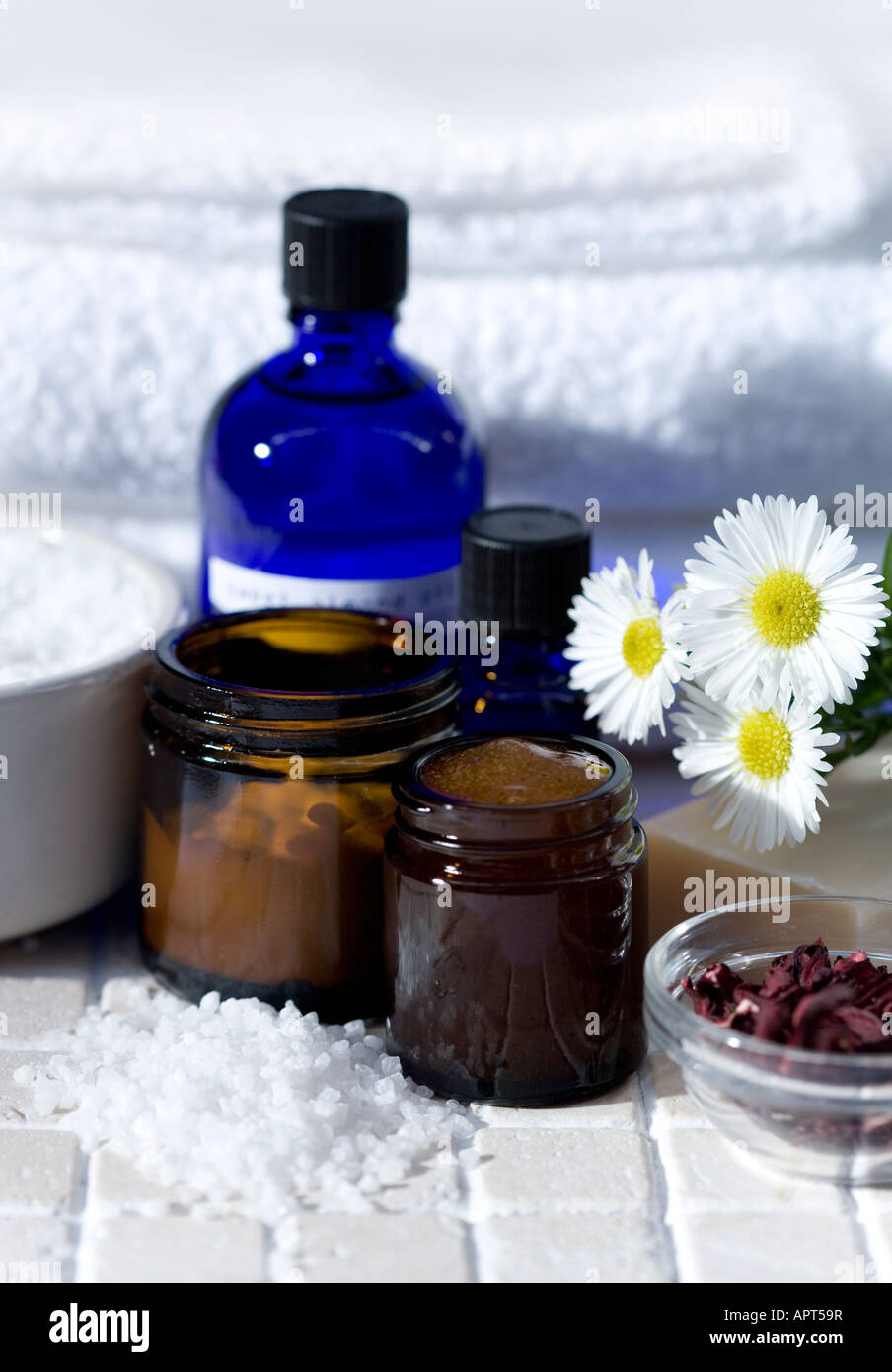 Blue glass Essential oils containers filled with organic oils dried