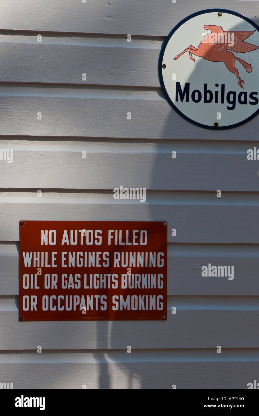 Mobilgas and Warning Sign Stock Photo